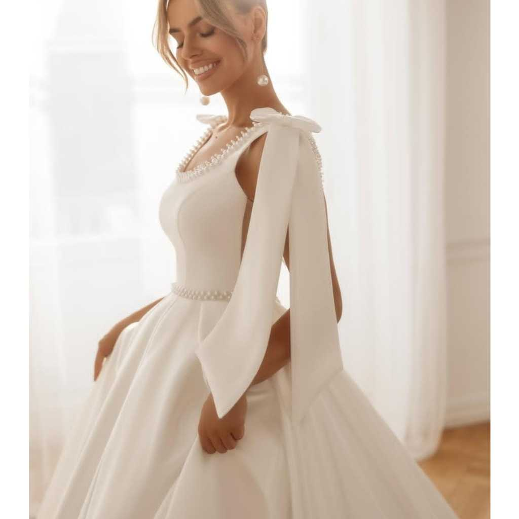 VESTIDO DE NOIVA LONGO MINIMALISTA COM APLICACÃO DE PÉROLAS NO BUSTO