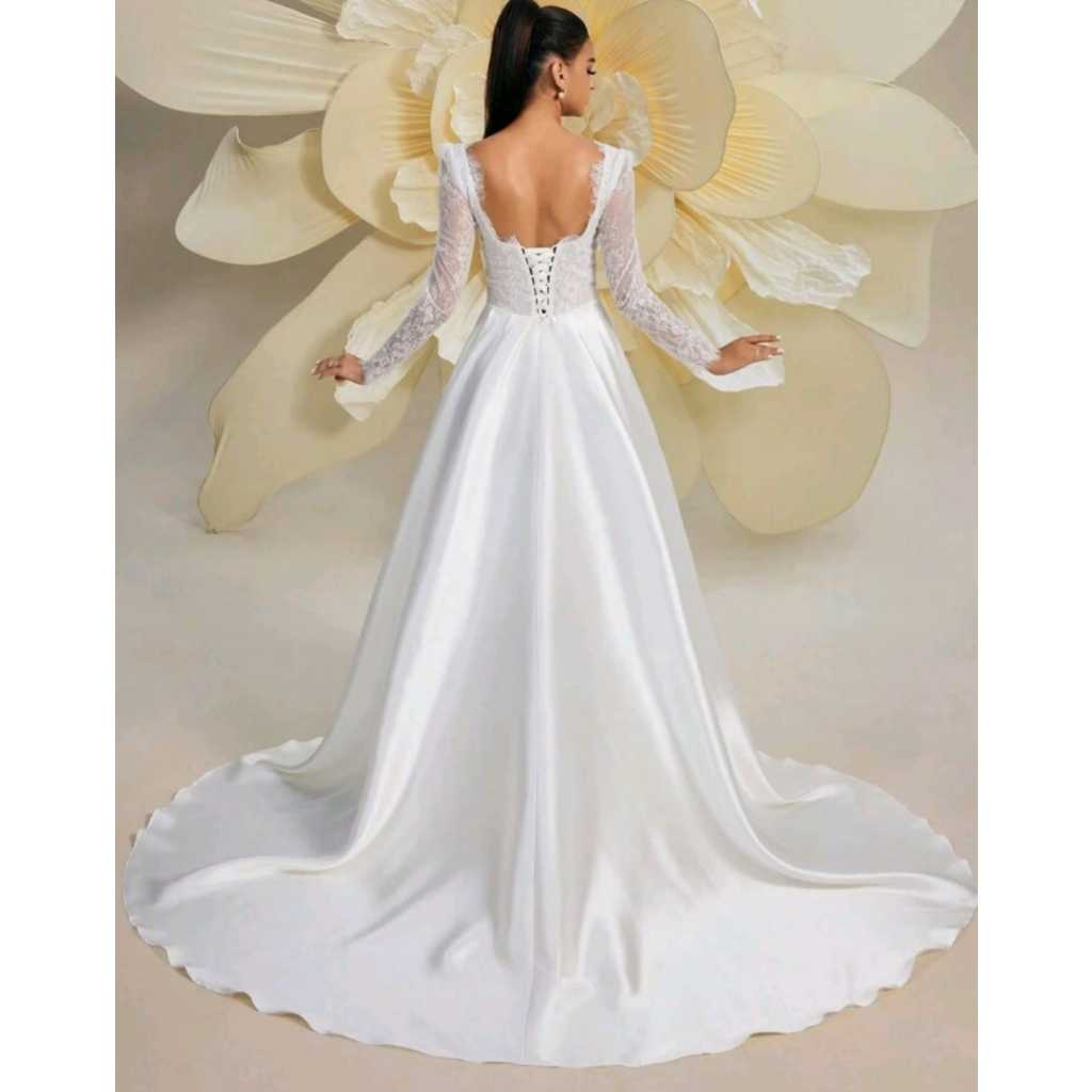 VESTIDO DE NOIVA COM MANGA LONGA E BUSTO EM RENDA
