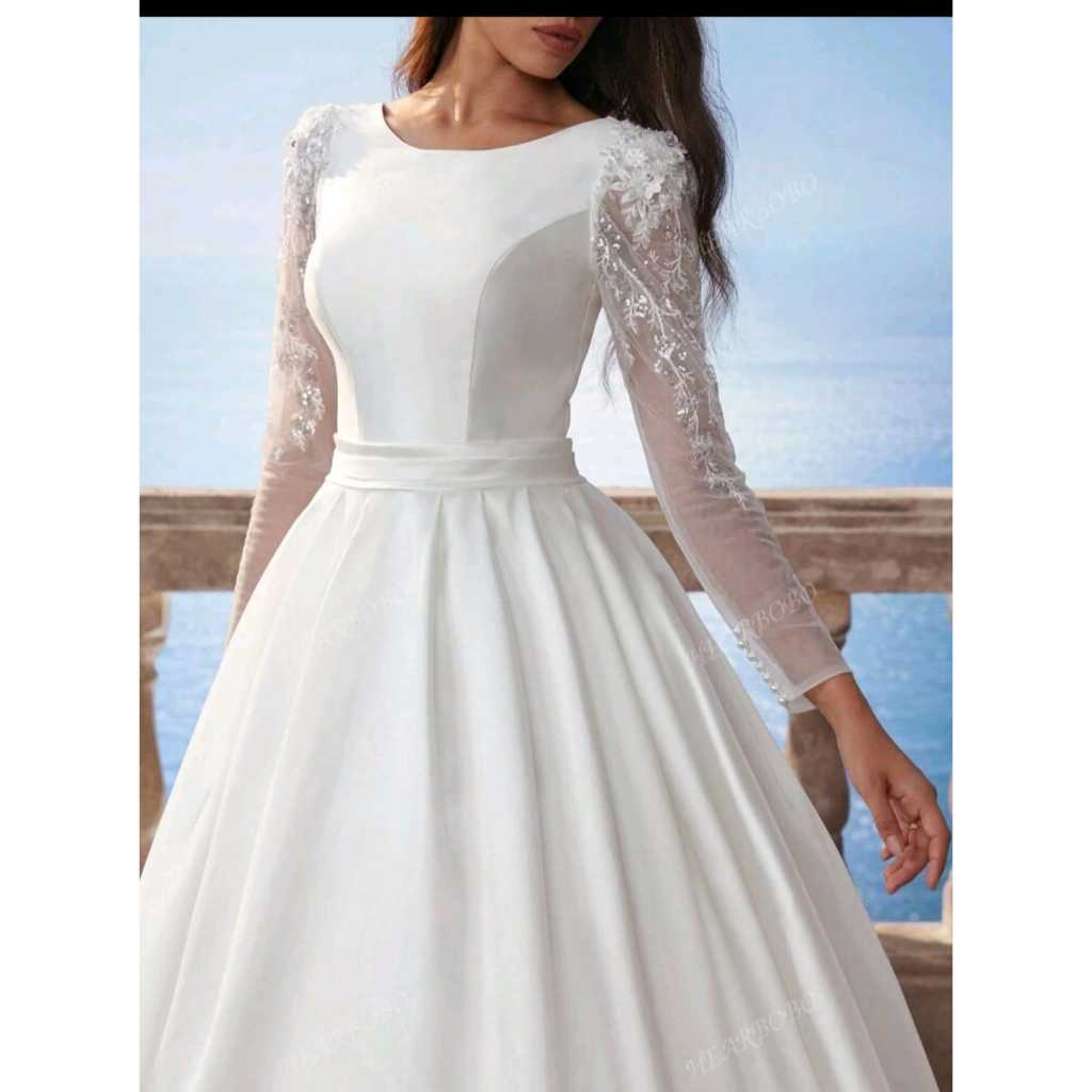 VESTIDO DE NOIVA COM MANGAS LONGAS E SAIA PRINCESA
