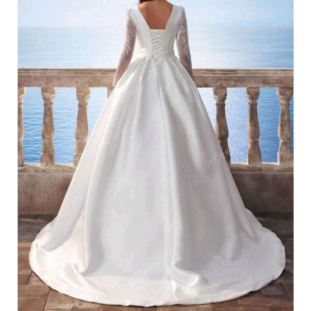 VESTIDO DE NOIVA COM MANGAS LONGAS E SAIA PRINCESA