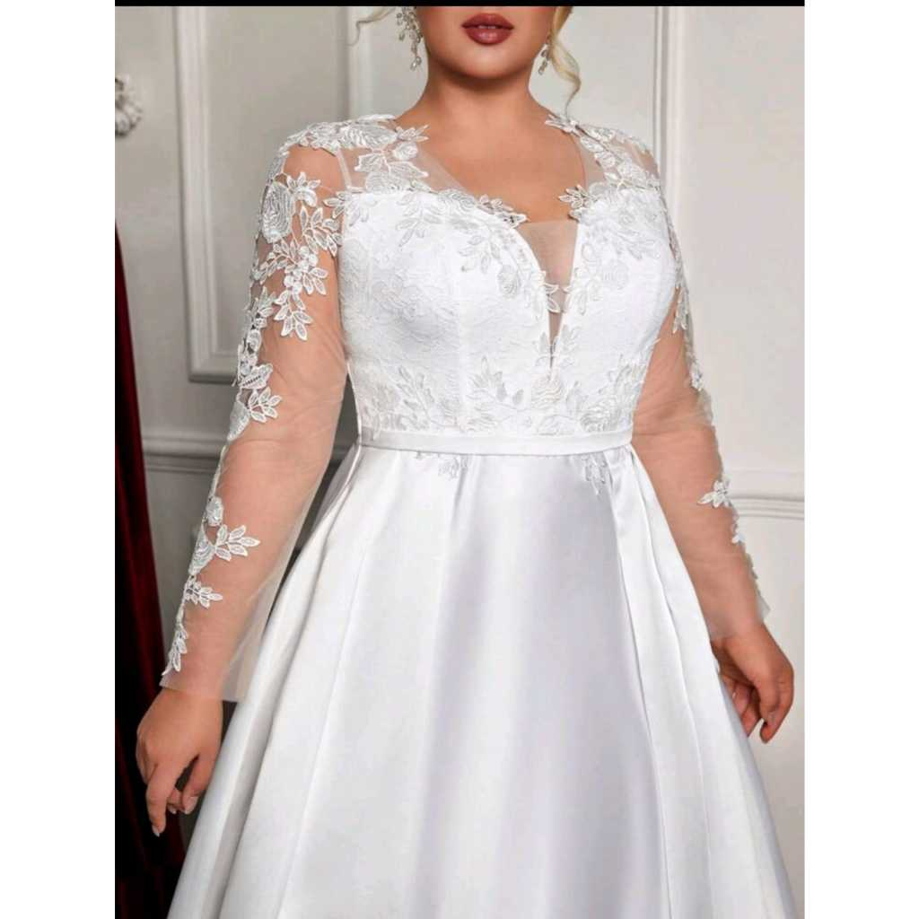 VESTIDO DE NOIVA COM BUSTO EM RENDA E MANGA LONGA