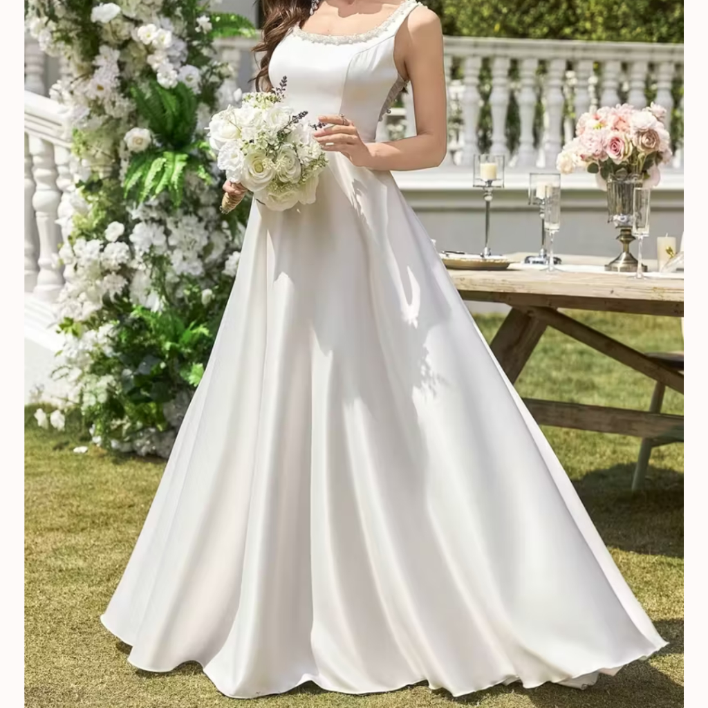 VESTIDO DE NOIVA COM APLICAÇÃO DE PÉROLAS
