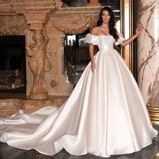 VESTIDO DE NOIVA COM MANGAS E DECOTE OMBRO A OMBRO