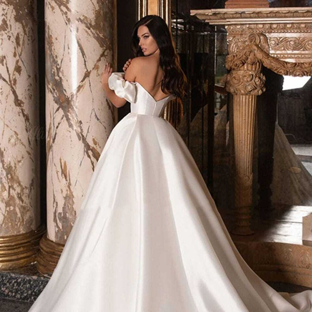 VESTIDO DE NOIVA COM MANGAS E DECOTE OMBRO A OMBRO