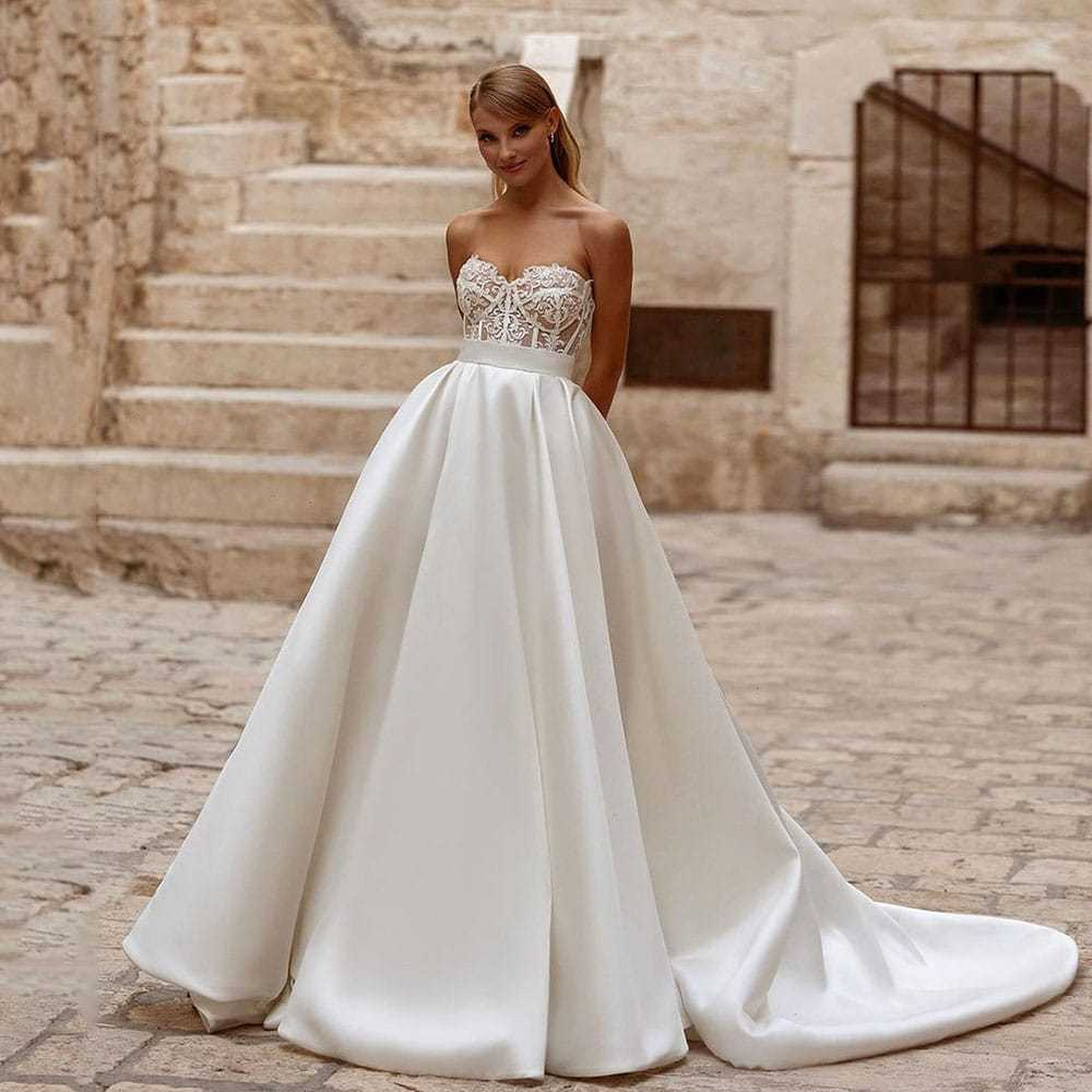 VESTIDO DE NOIVA COM BUSTO EM RENDA SEM ALÇAS