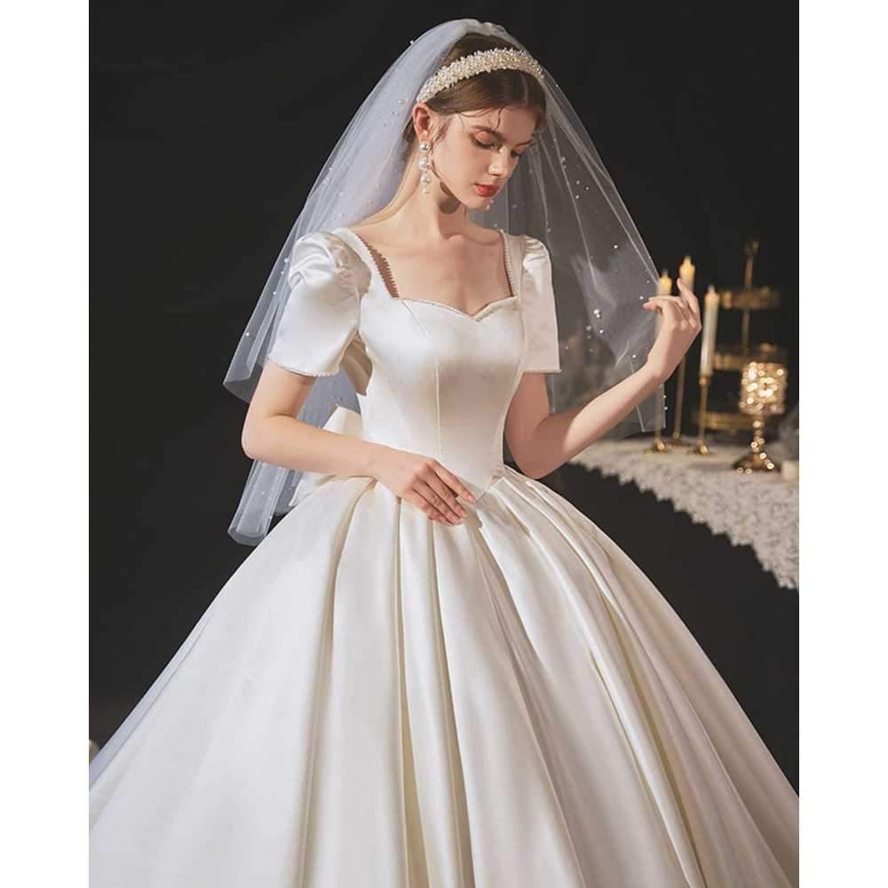 VESTIDO DE NOIVA COM MANGAS E DECOTE NAS COSTAS