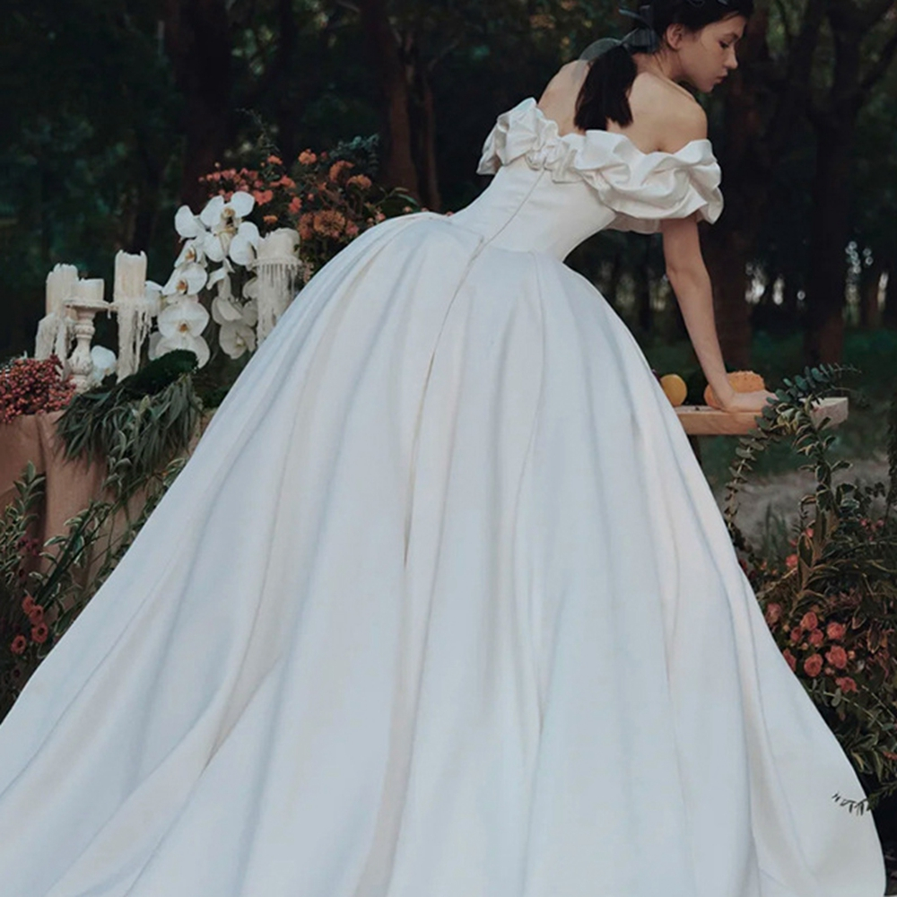 VESTIDO DE NOIVA COM MANGAS E DECOTE OMBRO A OMBRO